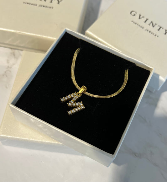 Crystal letter necklace.